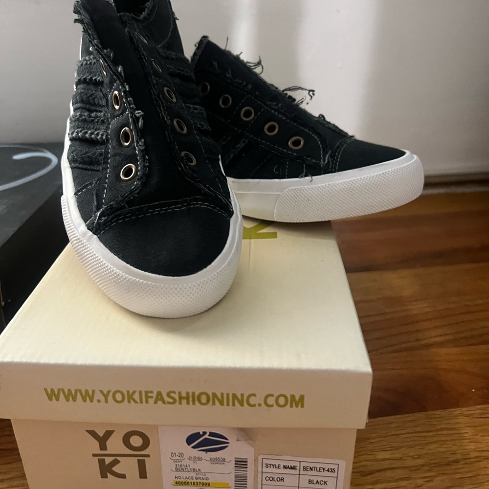 Black slip on sneakers